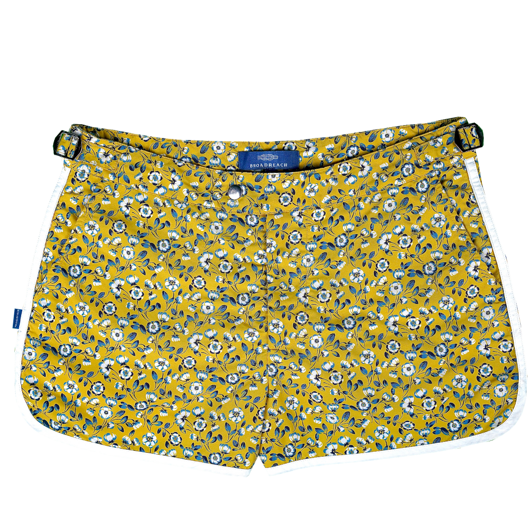 Product shot of Shoreliner swim shorts by BroadReach resort wear in Liberty Fabrics Folk Blooms print.